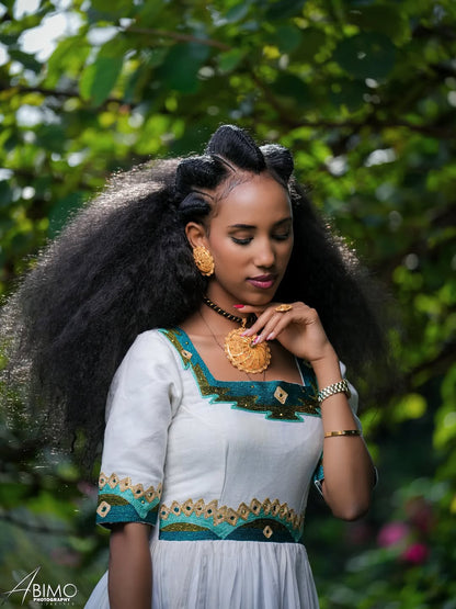 Green Menen Habesha libs: Traditional festive Tibeb Kemis