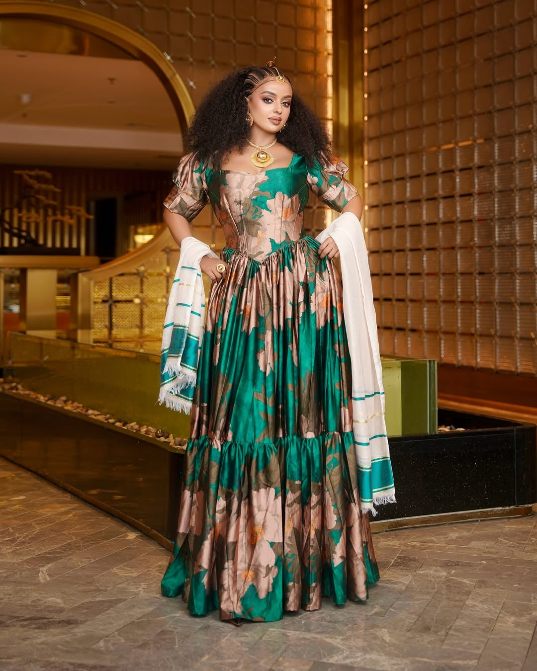 Green Floral Habesha Chiffon dress with Puff Sleeves and Coordinating Netela for Celebrations