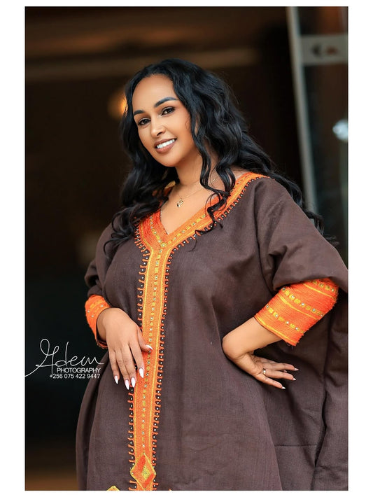 Brown Ethiopian Traditional Dress – Elegant Kaftan Style Cultural Outfit with Hand-Embroidered Patterns and Cross Design