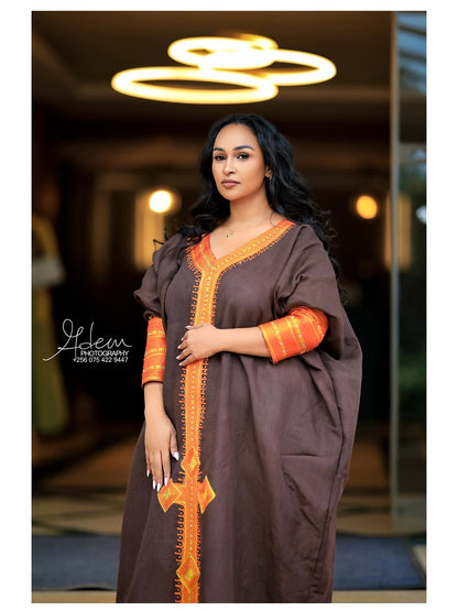 Brown Ethiopian Traditional Dress – Elegant Kaftan Style Cultural Outfit with Hand-Embroidered Patterns and Cross Design