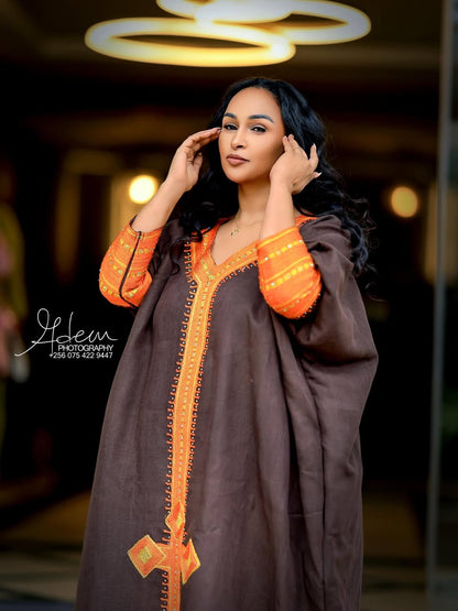 Brown Ethiopian Traditional Dress – Elegant Kaftan Style Cultural Outfit with Hand-Embroidered Patterns and Cross Design