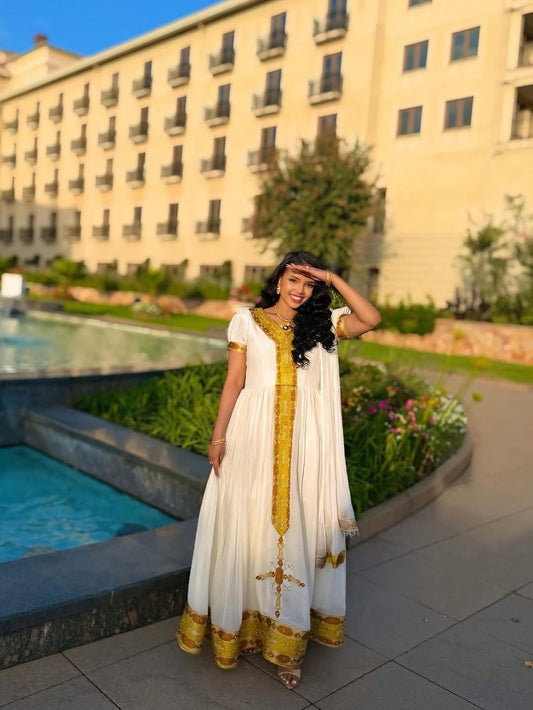 Gold Habesha Libs – Regal Ethiopian Traditional Dress with Wide Tibeb Detailing for Grand Weddings, Cultural Showcases & Elite Celebrations