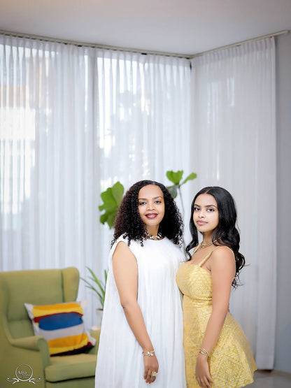 Family Habesha Set – Elegant White & Gold Ethiopian Holiday Outfits by Tsehaye Mehari