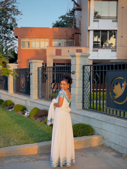 Blue Habesha Kemis with Graceful Flowing Silhouette for Church Events