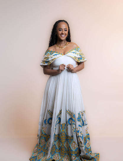 Green Classic Habesha zuria finished with Gold tilf embroidery for engagement ceremonies