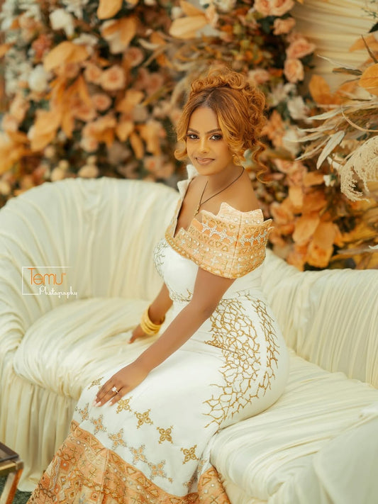 Gold Mermaid Habesha  Zuria – White and Gold Hand-Embroidered Ethiopian Wedding Dress for Brides and Royal Cultural Celebrations