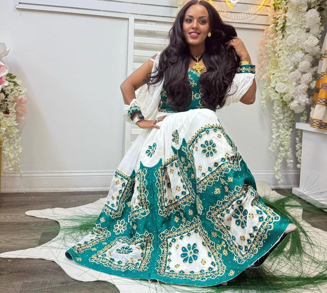 Green Ethiopian Kemis with Wide Tibeb – Traditional Habesha Dress with Bold Woven Detail for Cultural Events