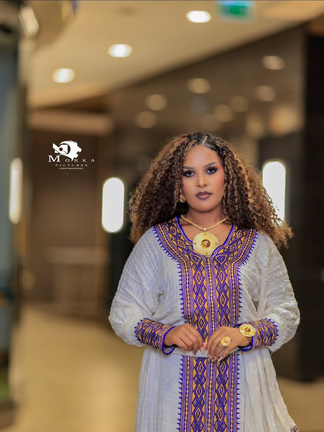 Elegant White Ethiopian Traditional Dress with Purple & Lavender Tilf Embroidery