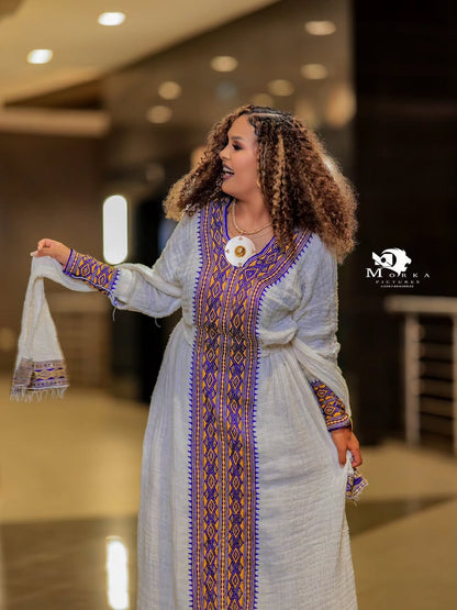 Elegant White Ethiopian Traditional Dress with Purple & Lavender Tilf Embroidery
