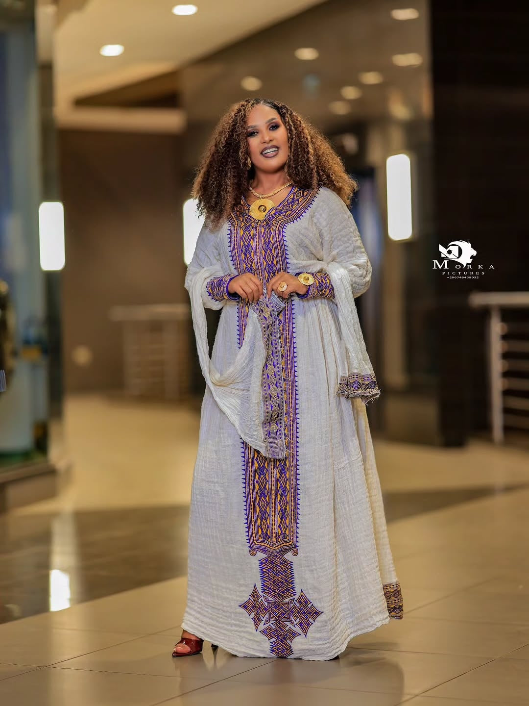 Elegant White Ethiopian Traditional Dress with Purple & Lavender Tilf Embroidery