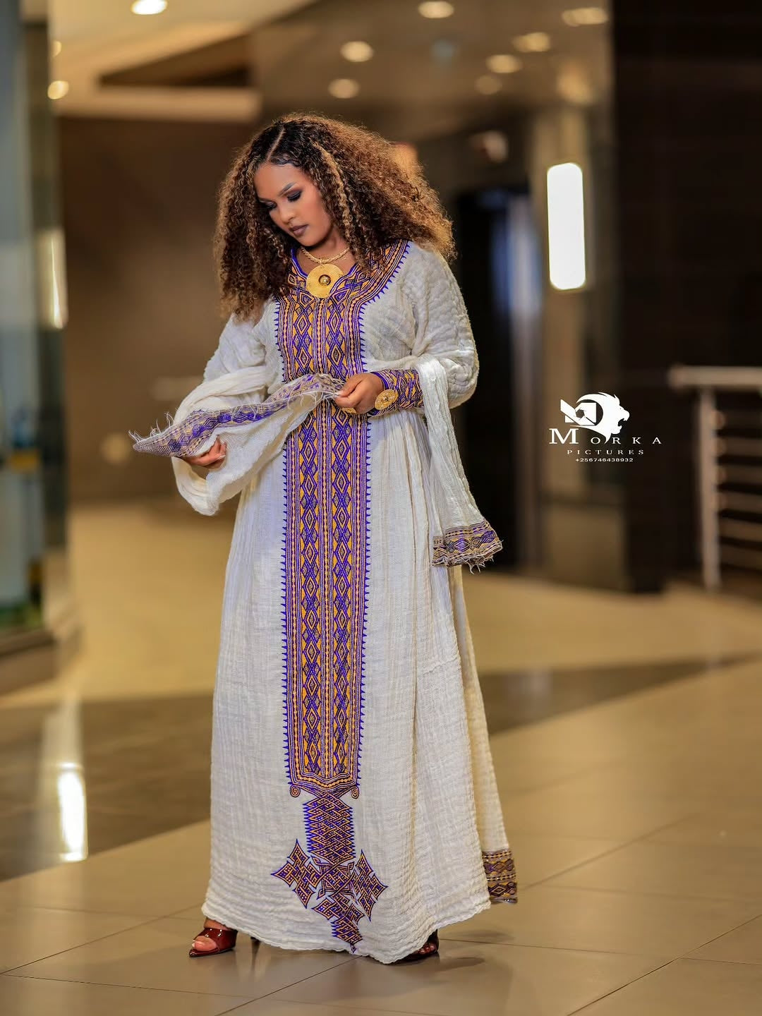 Elegant White Ethiopian Traditional Dress with Purple & Lavender Tilf Embroidery