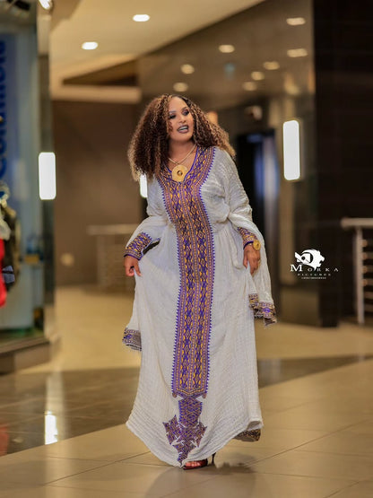 Elegant White Ethiopian Traditional Dress with Purple & Lavender Tilf Embroidery