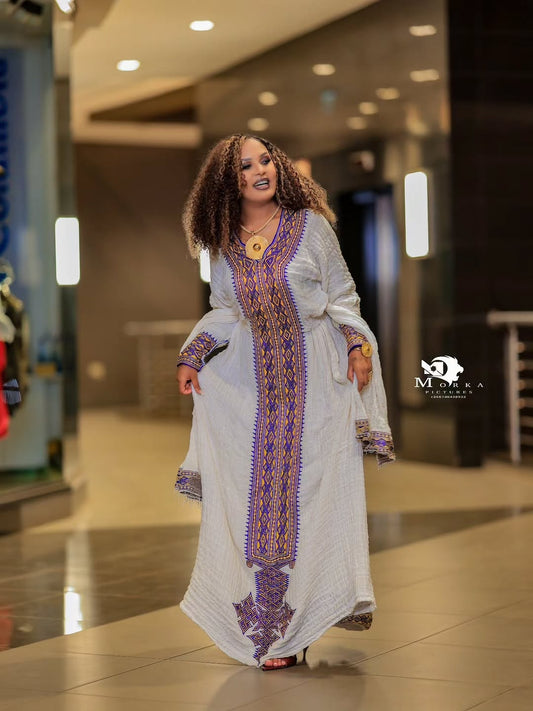Elegant White Ethiopian Traditional Dress with Purple & Lavender Tilf Embroidery