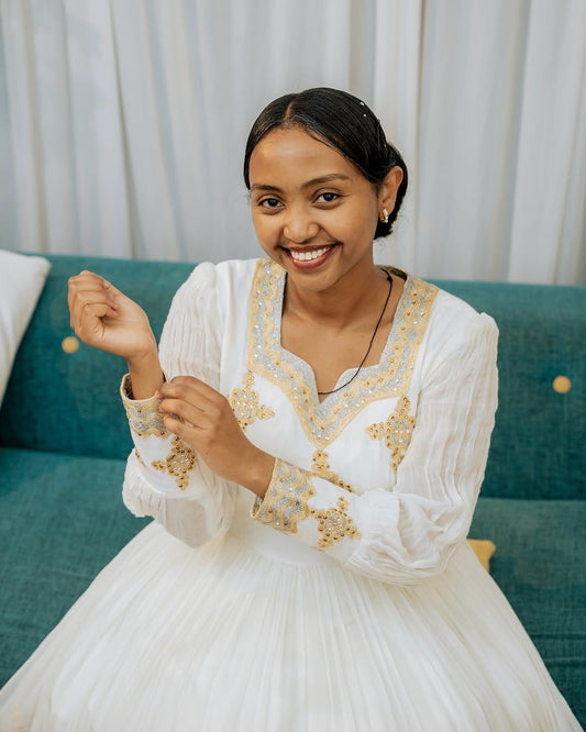Gold Habesha Kemis – Classic Ethiopian Traditional Dress with Elegant Tilf Detailing for Weddings and Cultural Events