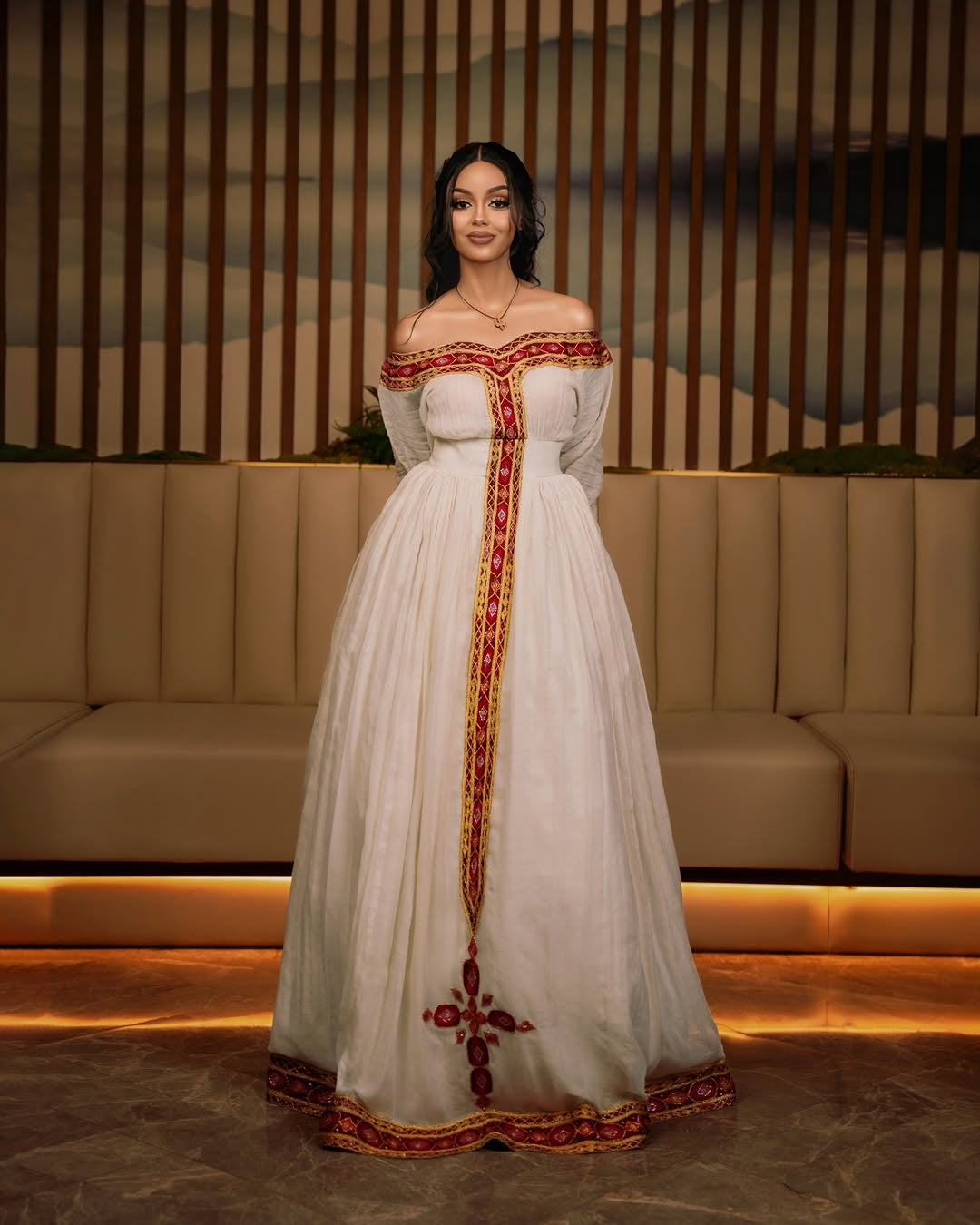 Traditional Habesha cultural dress photographed on elegant, decorated place.
