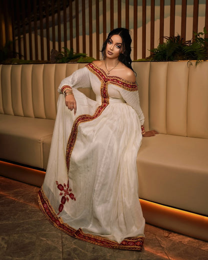 Traditional Habesha cultural dress photographed on elegant, decorated place.