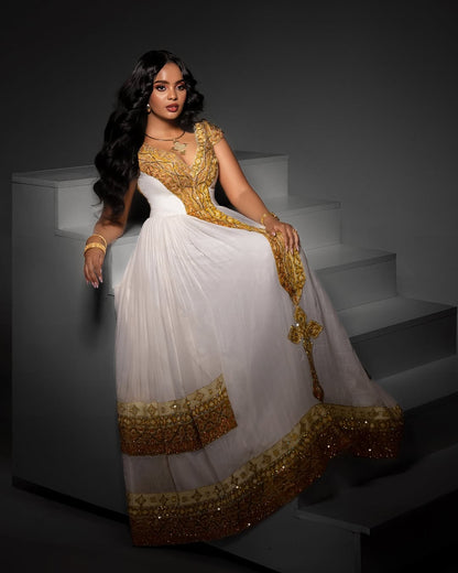 Gold Habesha dress – Luxury Ethiopian traditional Dress with Wide Tilf Embroidery