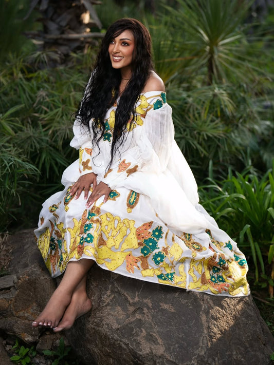 Gold Traditional Habesha Dress from an Ethiopian Store Online – Embroidered, Flowing Style for Church Events