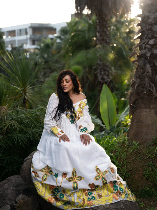 Gold Traditional Habesha Dress from an Ethiopian Store Online – Embroidered, Flowing Style for Church Events