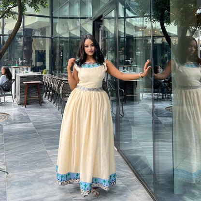 Women's blue Handwoven Cotton Habesha Dress for Wedding | Traditional Ethiopian Dress with Tibeb Border