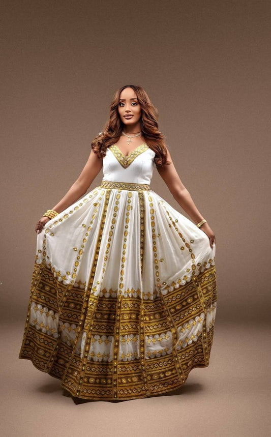የወርቅ ሃበሻ ቀሚስ – በእጅ የተሠራ የኢትዮጵያ ልብስ ለሴቶች
