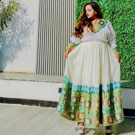 Green Ethiopian Traditional Dress – Graceful Habesha Outfit with Subtle Woven Detailing for Formal Events and Special Occasions