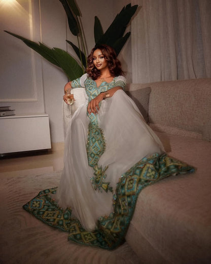 Teal Ethiopian kemis with Geometric Tilet Embroidery – Ethiopian Traditional Dress for Weddings & Celebrations