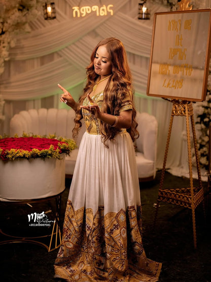 Gold Habesha Kemis Full Tibeb – Luxurious Ethiopian Wedding Sleeveless dress for Bride  with Beautiful Embroidery