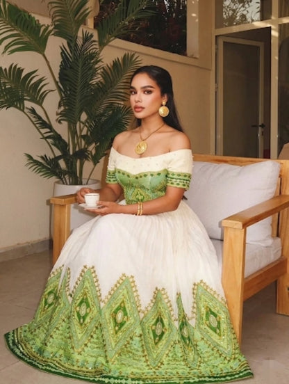 Green Full Tilf Off-Shoulder Ethiopian Kemis – Elegant Habesha Dress with Rich Traditional Embroidery for Weddings and Special Occasions