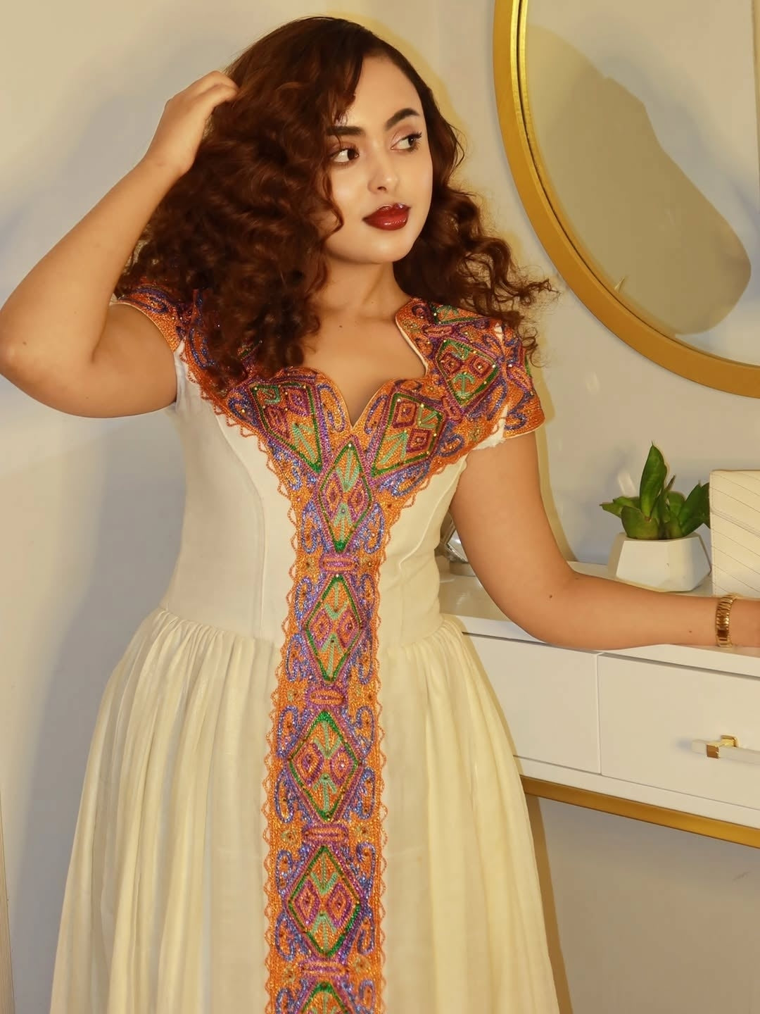 Orange Luxury Bridal Habesha Kemis – Ethiopian Wedding Guest Dress with Handmade Tibeb Details & Gold Embroidery