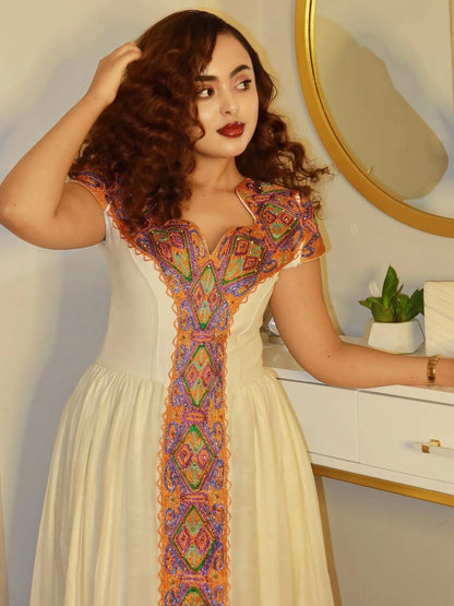 Orange Luxury Bridal Habesha Kemis – Ethiopian Wedding Guest Dress with Handmade Tibeb Details & Gold Embroidery