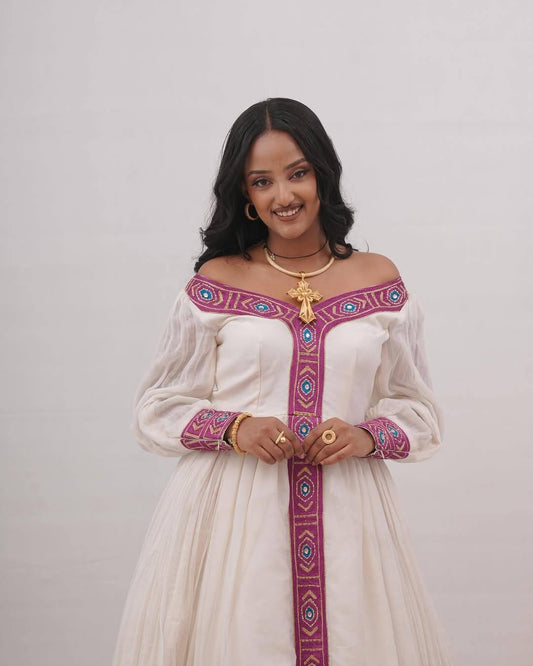 Women's pink Traditional Cotton Habesha Kemis for Cultural Events | Traditional Ethiopian Dress with Tilf Border