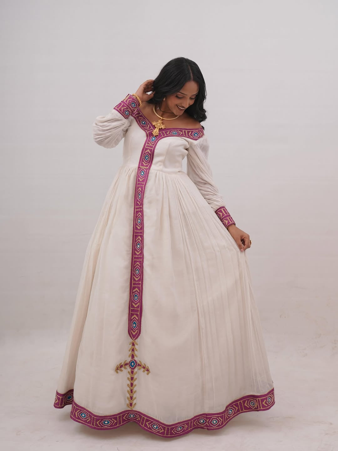 Modern Off-the-Shoulder Habesha Kemis with Traditional Embroidery & Long Sleeves for Weddings & Cultural Occasions