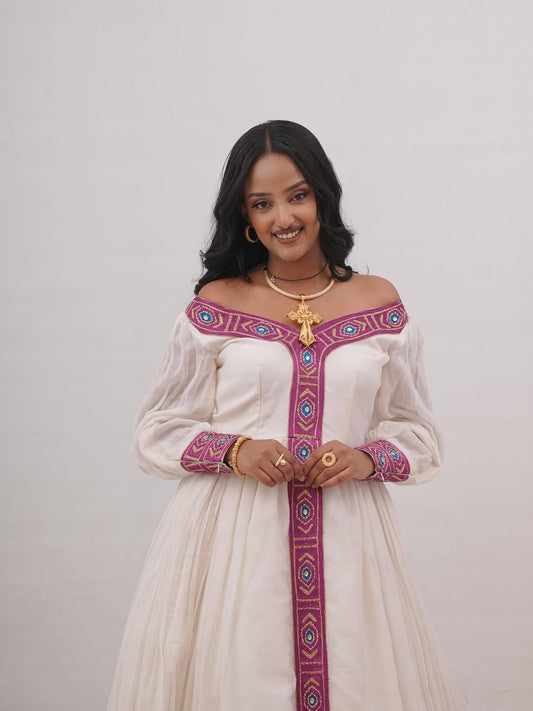Modern Off-the-Shoulder Habesha Kemis with Traditional Embroidery & Long Sleeves for Weddings & Cultural Occasions