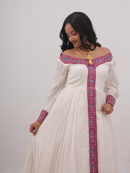 Modern Off-the-Shoulder Habesha Kemis with Traditional Embroidery & Long Sleeves for Weddings & Cultural Occasions