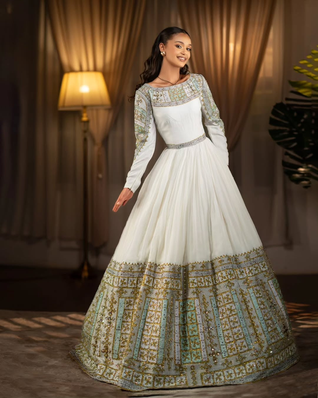 Green Habesha Libs – Hand-Woven Ethiopian Traditional Dress with Elegant Tilf Embroidery and Flowing Pleated Skirt