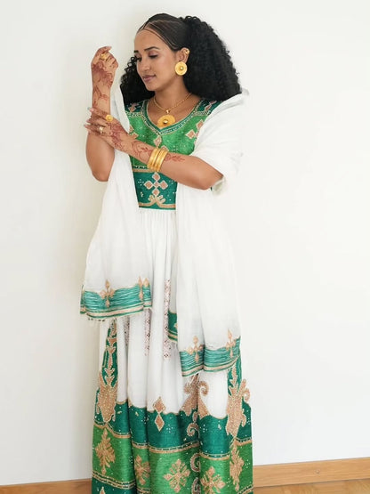 Green Ethiopian Traditional Dress – Elegant Cultural Outfit with Full Tibeb Embroidery and Classic Heritage Design