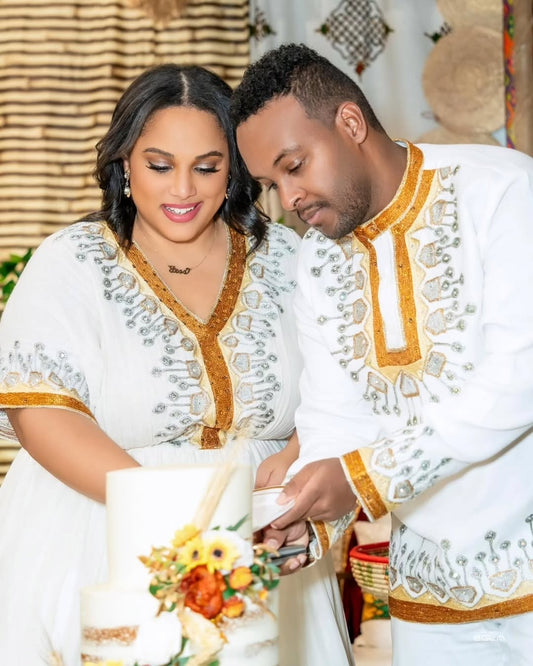 Gold Ethiopian Matching Couple’s Set – Elegant Habesha Wedding Outfit with Hand-Woven Cotton Bridal dres and Coordinated Groom Shirt for Mels and Engagement Ceremonies