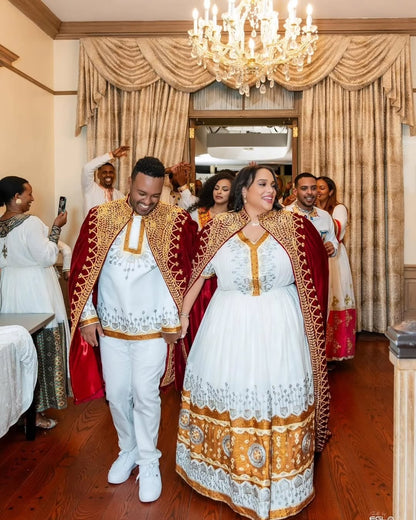 Gold Ethiopian Matching Couple’s Set – Elegant Habesha Wedding Outfit with Hand-Woven Cotton Bridal dres and Coordinated Groom Shirt for Mels and Engagement Ceremonies