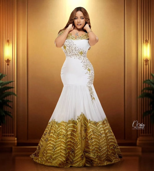 Gold Habesha Kemis – Modern Mermaid Ethiopian Wedding Dress with Off-Shoulder Design and Handcrafted Tilf Embroidery