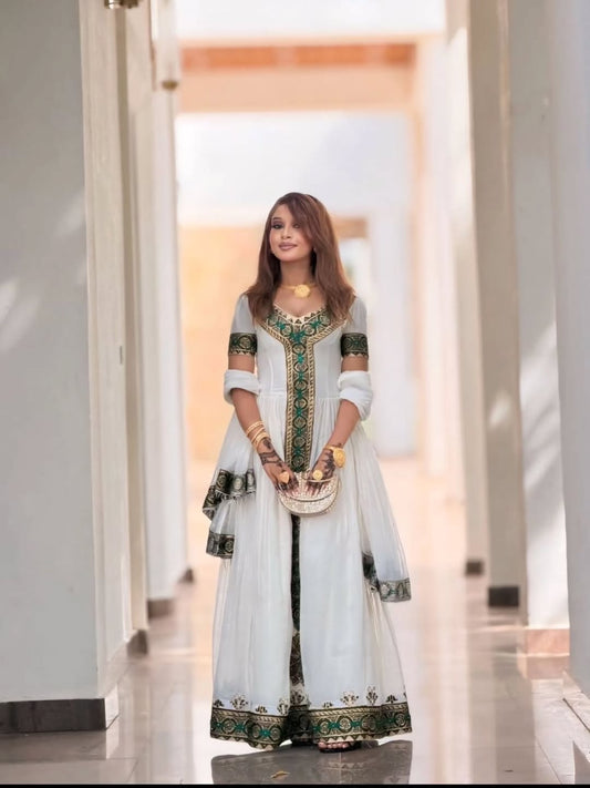 Elegant Green Ethiopian Kemis – Traditional Habesha Dress with Handwoven Fabric and Detailed Tilf Embroidery for Weddings and Cultural Celebrations