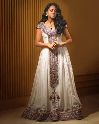 Stunning Traditional Habesha Dress with Intricate Purple & Gold Tilet