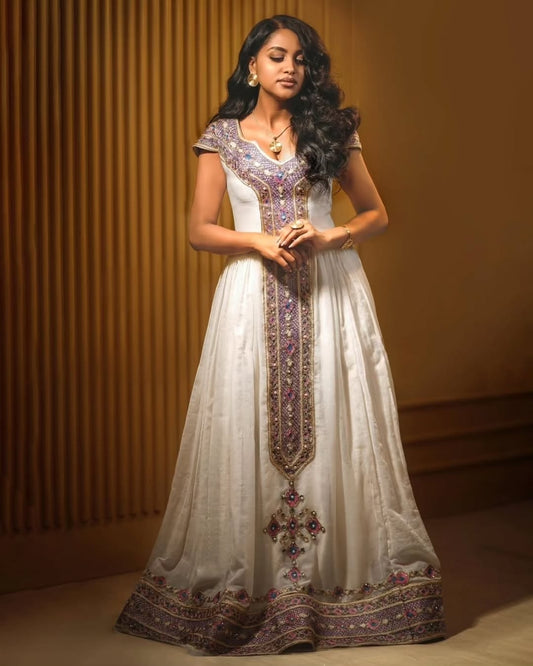 Stunning Traditional Habesha Dress with Intricate Purple & Gold Tilet
