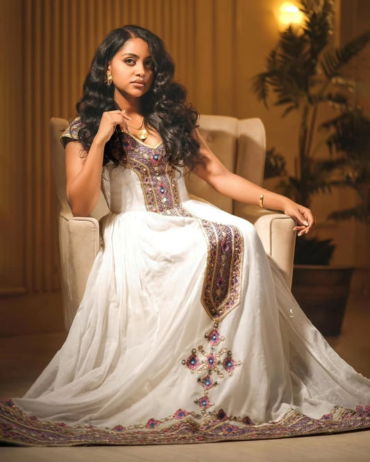 Stunning Traditional Habesha Dress with Intricate Purple & Gold Tilet
