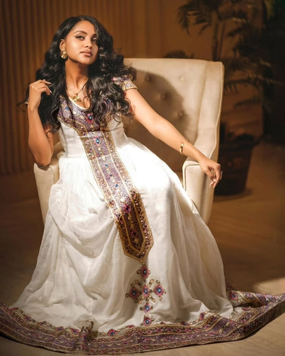 Stunning Traditional Habesha Dress with Intricate Purple & Gold Tilet