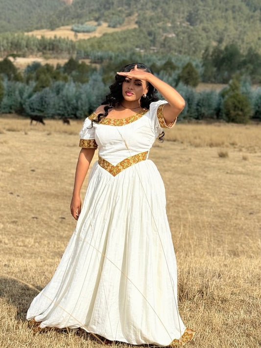 Gold Habesha Zuria – Traditional Ethiopian Dress for Cultural Celebrations and Elegant Occasions