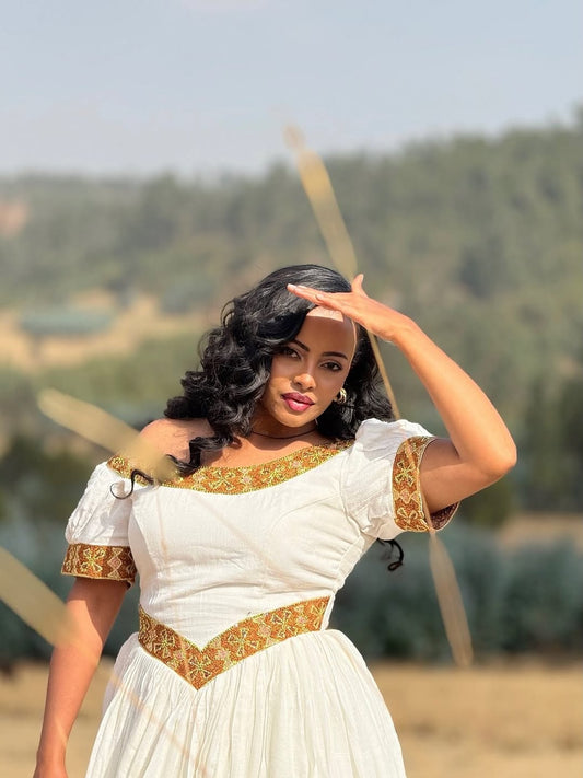 Gold Habesha Zuria – Traditional Ethiopian Dress for Cultural Celebrations and Elegant Occasions