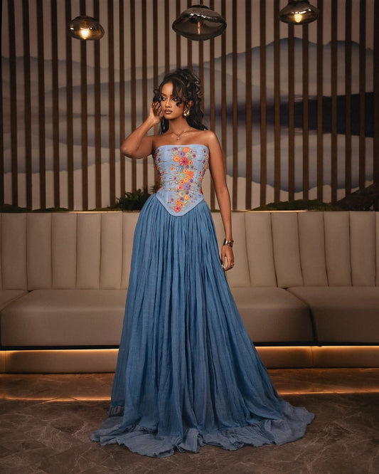 Blue Ethiopian Dress – Modern Corset Gown with Hand-Embroidered Tilf Detail and Flowing Pleated Skirt