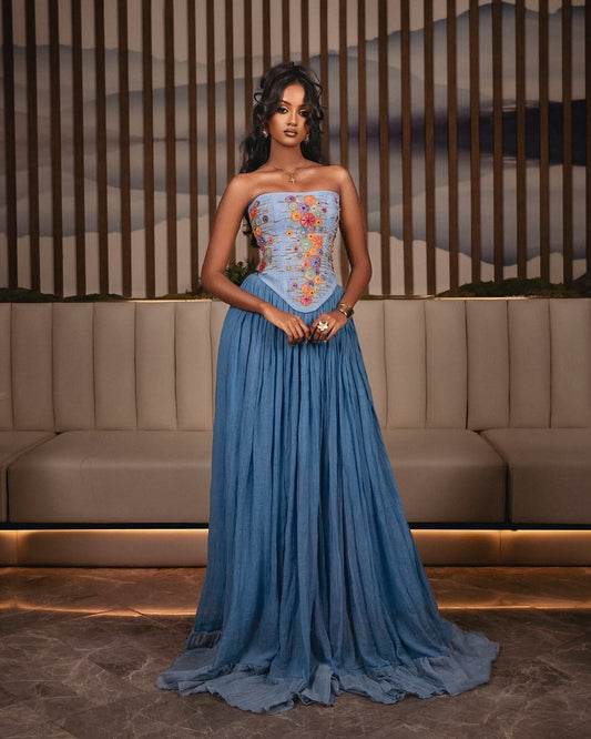 Blue Ethiopian Dress – Modern Corset Gown with Hand-Embroidered Tilf Detail and Flowing Pleated Skirt