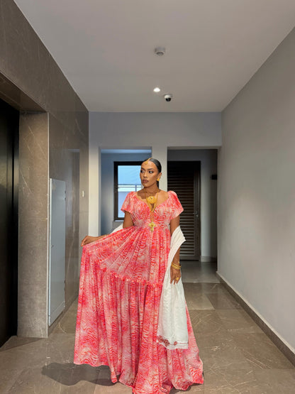 Pink chiffon Habesha zuria with silver tilf embroidery for Fasika and engagement ceremonies
